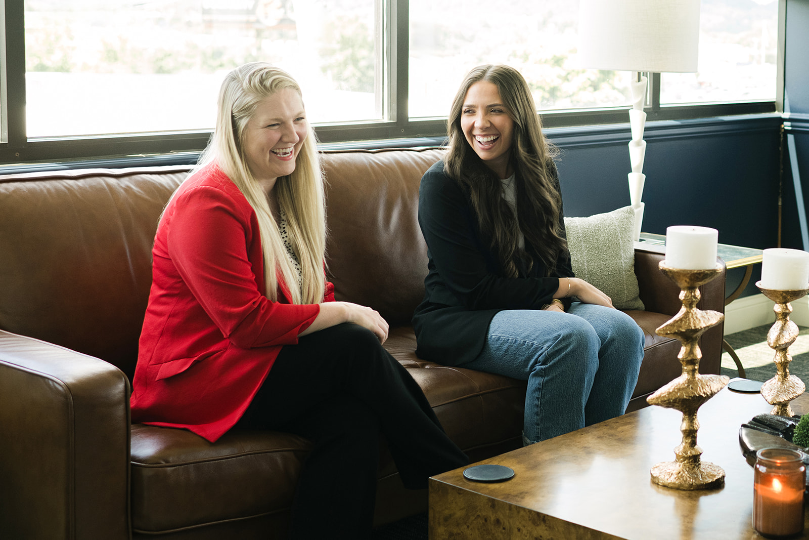 Talley Wealth team members in conversation at the office